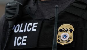 ICE Agent Discusses Warrant With Bystander